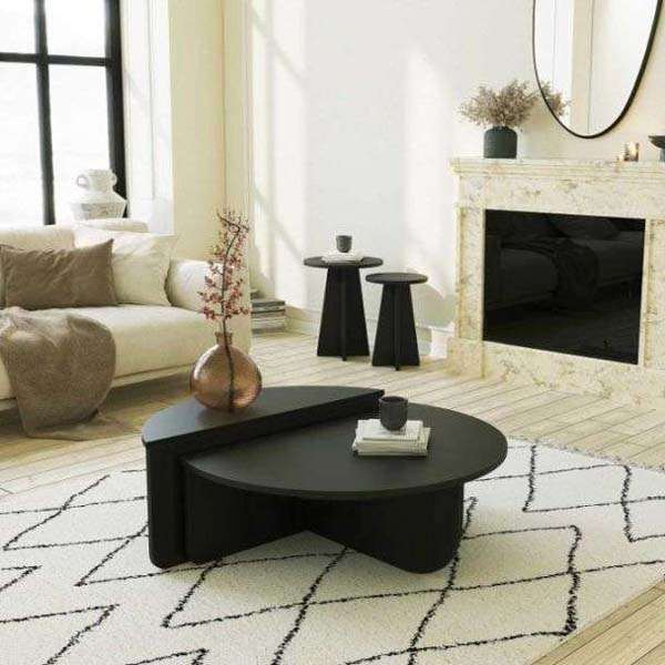 decoration-salon-moderne-table-basse-ronde-noire-asymetrique-design